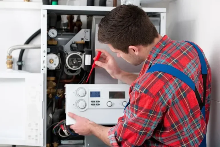 monroe-plumber-repairing-water-heater